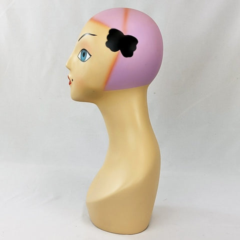 Vintage style hand painted mannequin head.